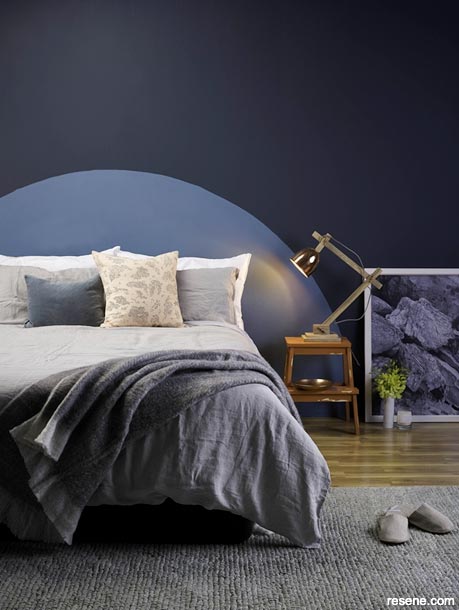 A dark blue bedroom