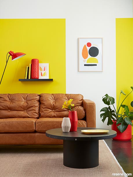 A lounge with bright yellow colour blocks