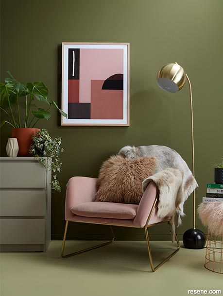 A lounge with celery, olive, blush, and terracotta tones