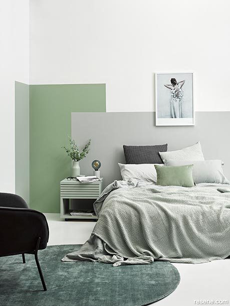 A sage green and silver bedroom