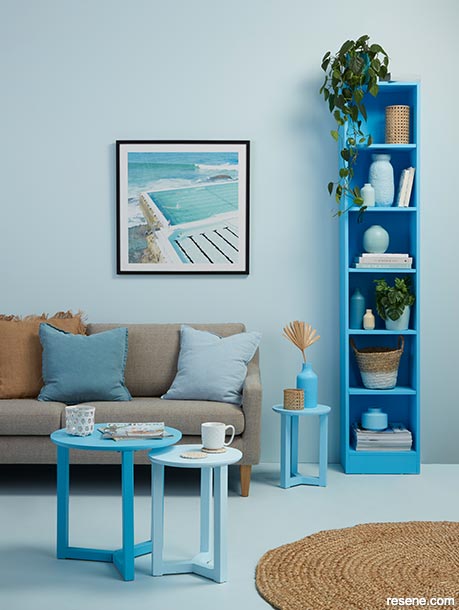A lounge with a blue tone-on-tone colour palette