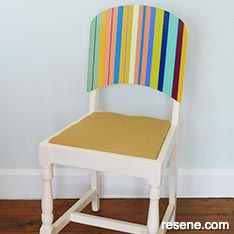 Paint a stripes on a wooden chair