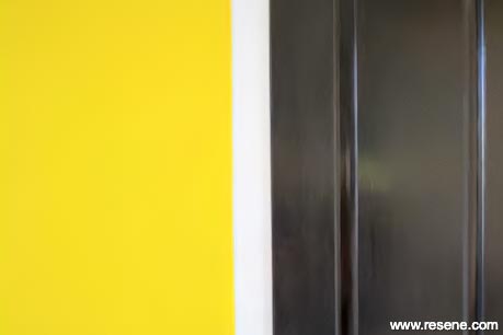 A yellow and black entryway