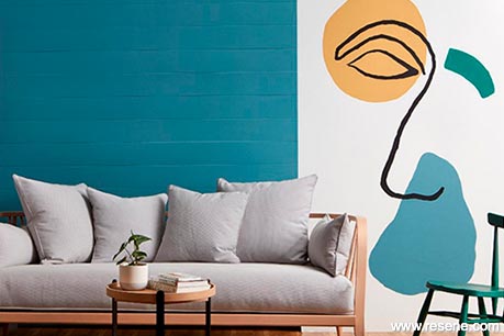 A face-inspired mural features in a lounge