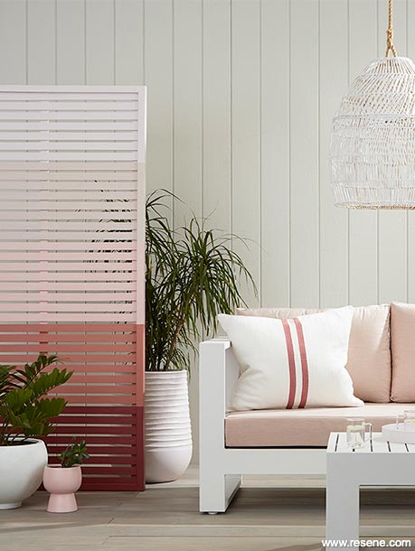 A painted outdoor slatted screen