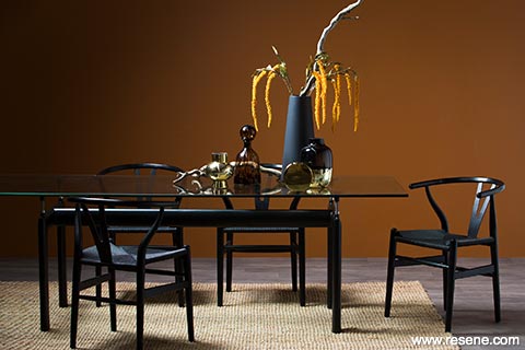 A sophisticated dining room in Resene Cinnamon