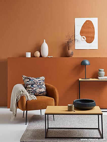 A sitting room in shades of orange and teracotta.