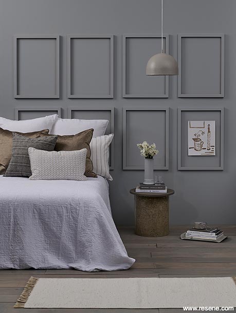 A grey panelled bedroom