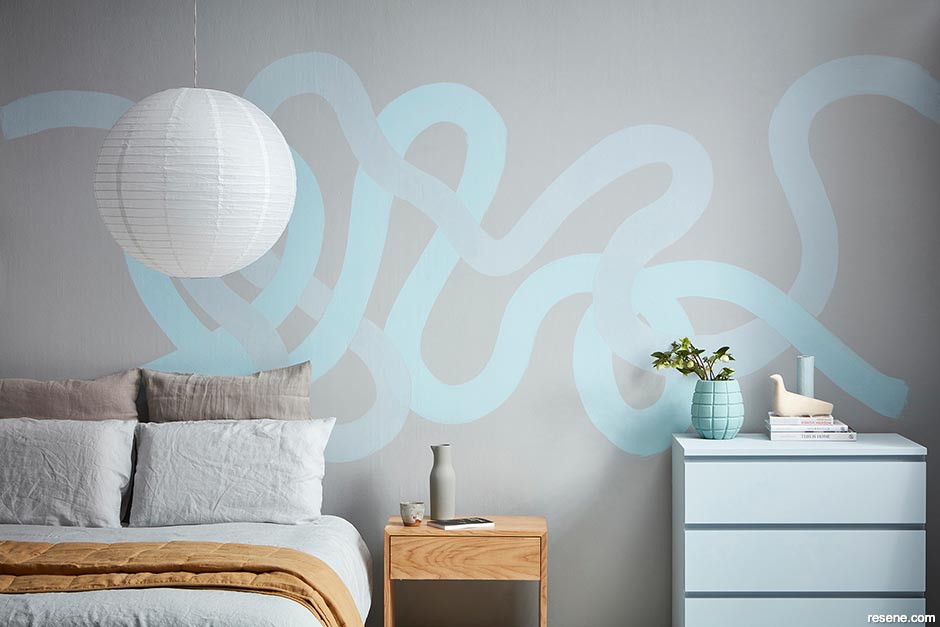 Bedroom with squiggle wall art