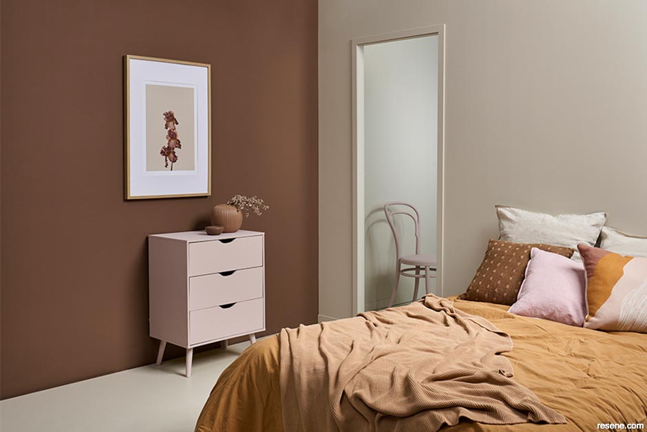 A brown master bedroom feature wall