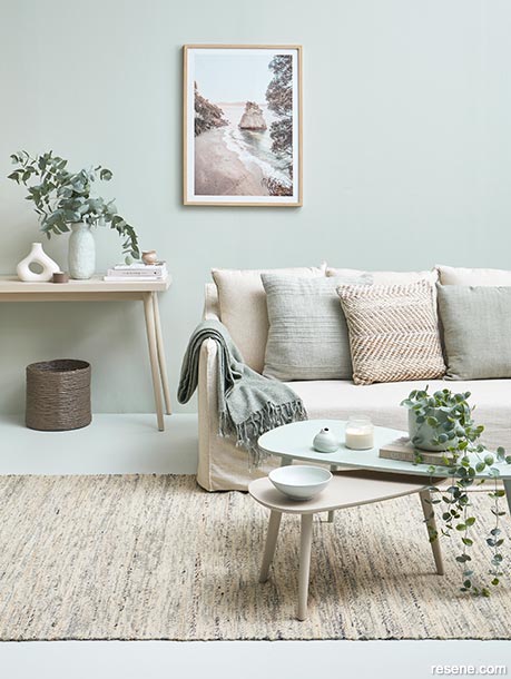 Botanical fnishes in a lounge with a muted tonal palette