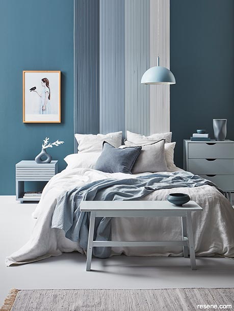 A denim blue bedroom