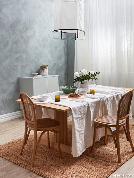 Soft textures make this dining room feel larger and more inviting