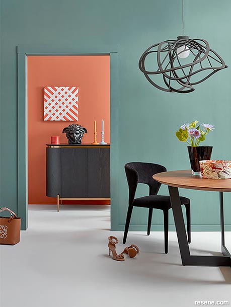 Dramatic contrasting colours draw the eye to connecting rooms