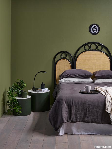 A green Art Nouveau inspired bedroom