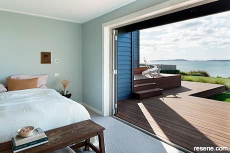 A master bedroom opens onto a kwila deck