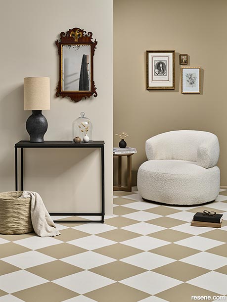 A lounge with a chequered floor pattern