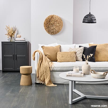 A lounge with parched tan and textured charcoals