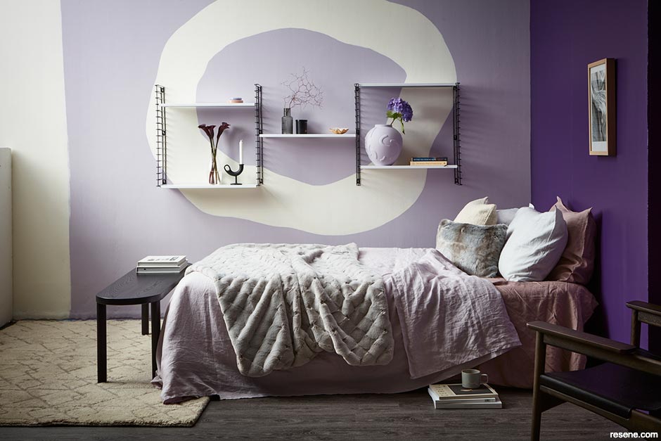 A purple and white bedroom - playful use of colour and shape