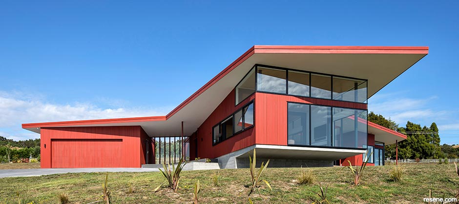 Red exterior clading - inspired by traditional barns in Resene Woodsman Whero