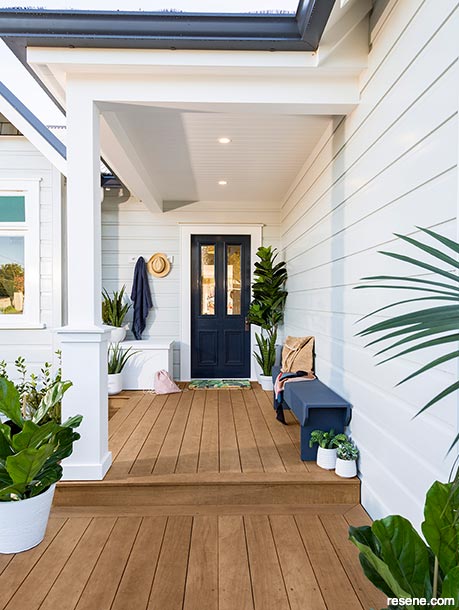 A stained deck sets the seaside tone of this home