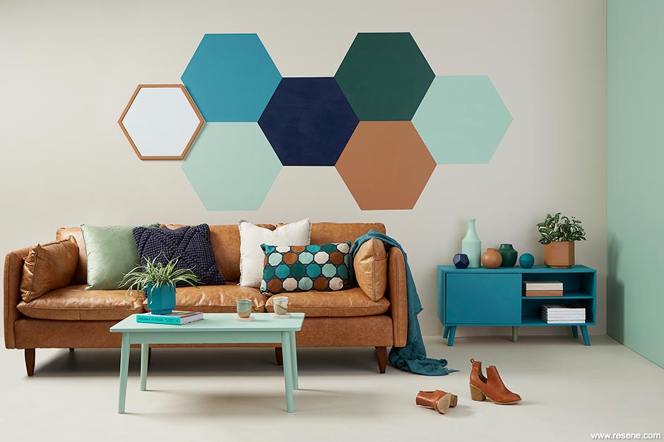 A lounge with painted geometric shapes on walls