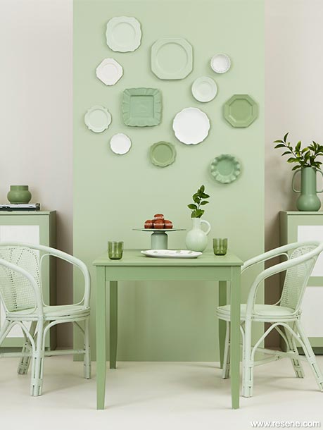 A green and white dining room