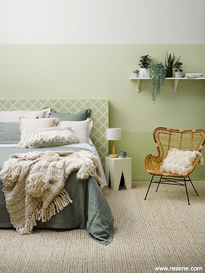 A calm room is shades of green and cream