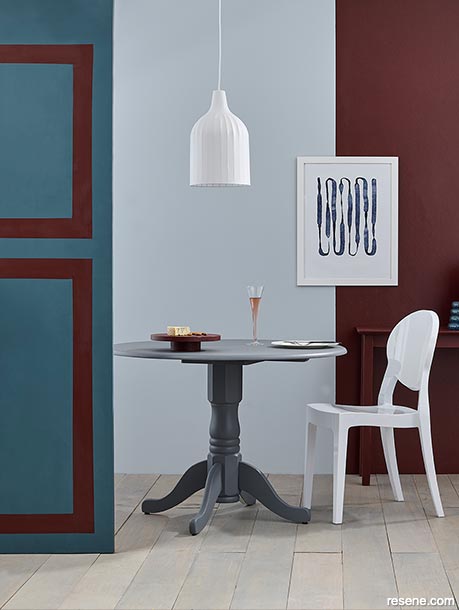 Dining room with burgandy and blue feature wall