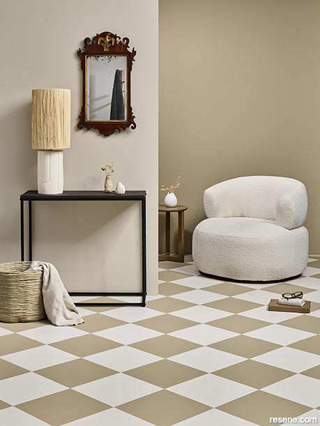 A welcoming home entryway with a checkerboard floor