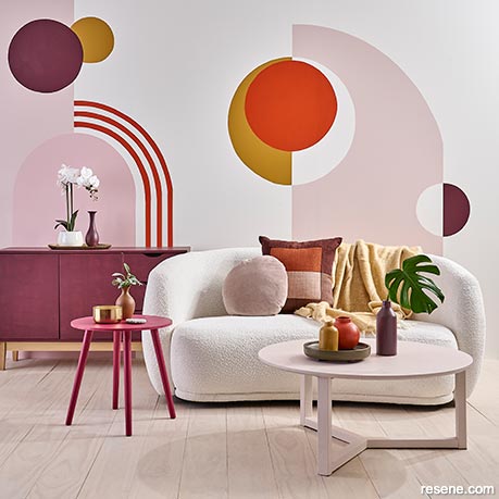 A vibrant lounge with a colourful wall mural