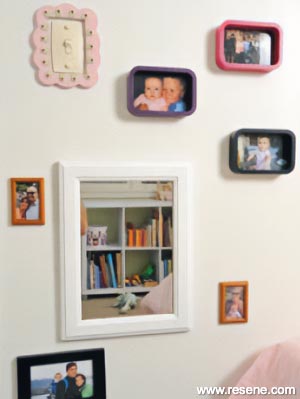 Picture frame wall in bedroom