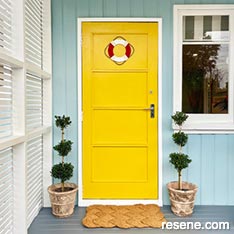 A yellow front door in Resene Galliano