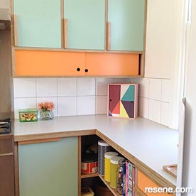 Orange and green kitchen