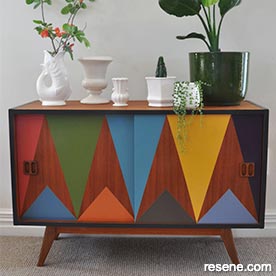 Paint a retro sideboard in a geometric pattern