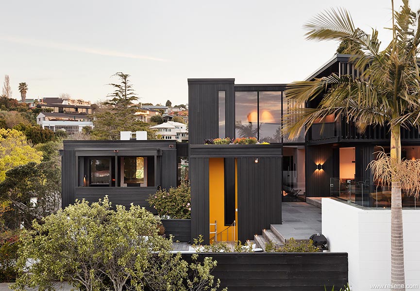 Railley House - breathtaking black exterior with yellow highlights