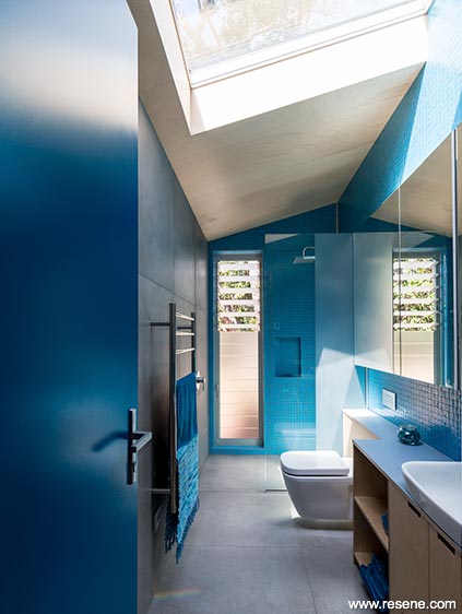 A bathroom in rich watery blue
