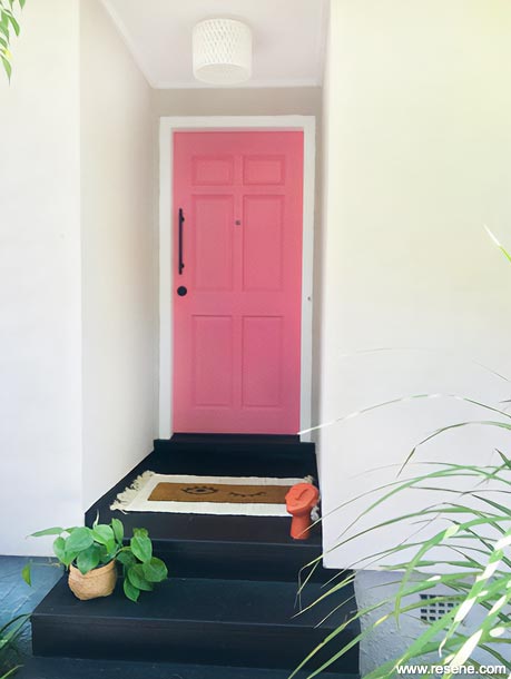 A pink home entryway