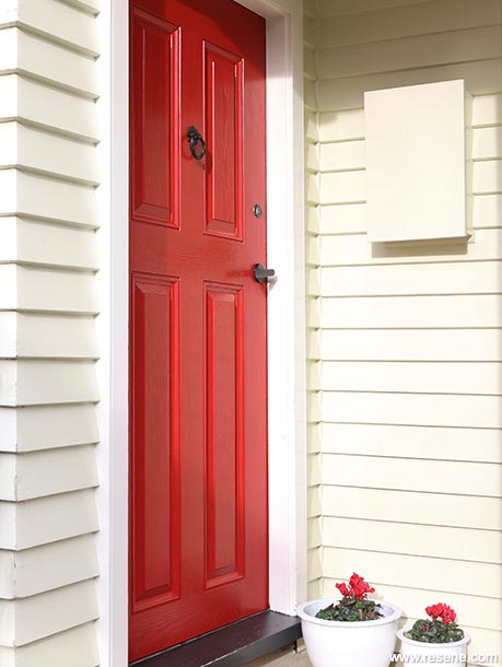 A bright red home entryway