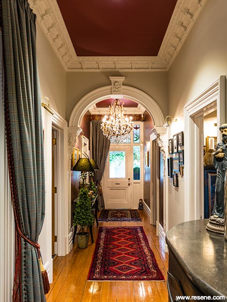A regal red villa hallway
