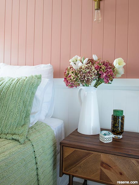 A white and salmon pink bedroom