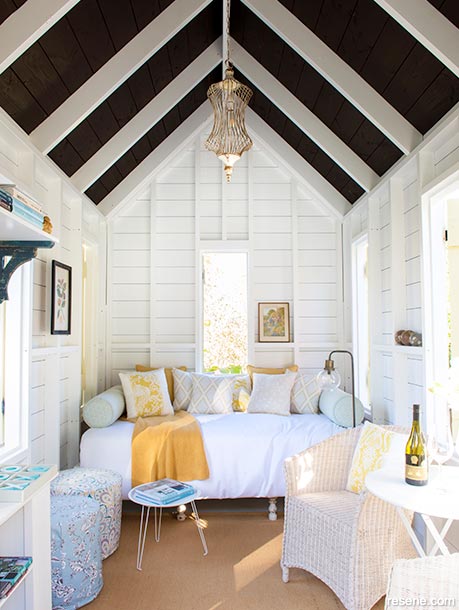 A summerhouse with a calming white interior