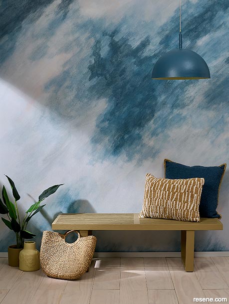 A wall mural painted with ocean inspired hues