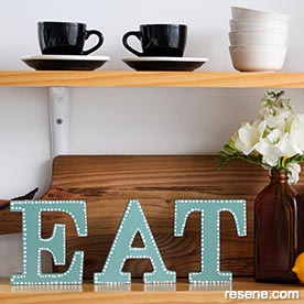 Paint letters to make a sign for your home