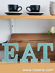 Paint letters to make a sign for your home
