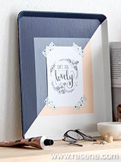 Upcycle a tray to make a colourful frame for your keepsakes