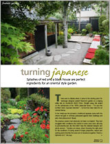 Splashes of red and a black house are perfect ingredients for an oriental style garden