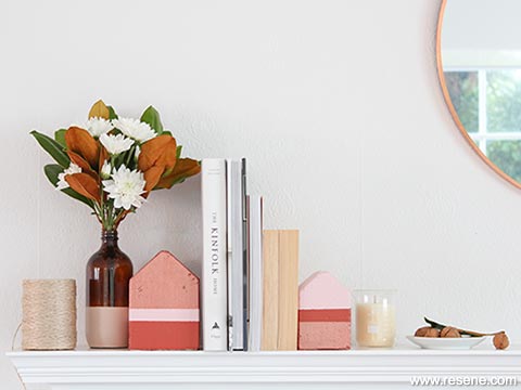 Paint cute wooden bookends for your mantle piece