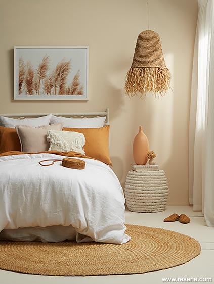 A bedroom in character neutral with warm accents
