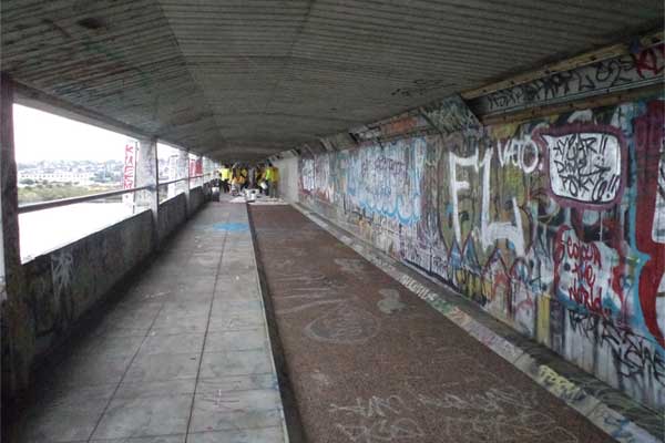 Grafitti on the Mangere Bridge walkway before painting